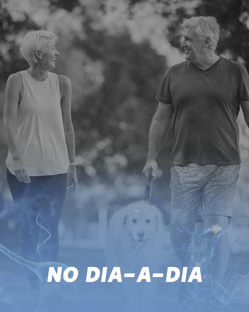 Imagem com uma mulher e um homem mais velhos a passear um cão. Contextualização da importância da saúde mental no dia-a-dia para assinalar o Dia Mundial do Cérebro